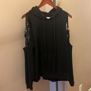 Black hoodie with open shoulder and ring detailing